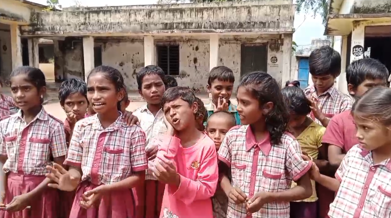 Students at the government primary school in Gosaam Palle express concerns over a teacher's behavior and lack of proper education, leading to protests.