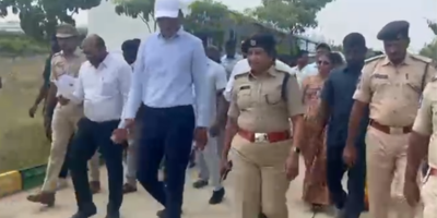 Siddipet Collector Manu Chaudhary, with Police Commissioner Anuradha, inspects Markook Police Station facilities and encourages officers' fitness.