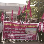 Construction workers gathered in Nandyal to protest for better welfare, fair sand mining, and government benefits under AITUC’s leadership.