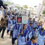 An awareness rally in Emmiganur led by District SP G. Bindu Madhav emphasized caution against rising cyber crimes and measures to prevent fraud.