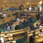 The Jammu Kashmir Assembly saw chaos over the restoration of Article 370, with strong opposition from BJP members. The resolution was passed to initiate discussions with the central government.