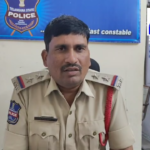 SI Narayana Gowd warns farmers about accidents from drying rice on roads and urges vigilance against cyber crimes. Cases will be filed against those responsible.