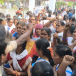 District Asha workers, led by the CITU, protested at the Amalapuram Collectorate, demanding resolution of their issues. Tension escalated with a scuffle between workers and police.