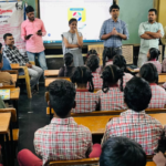 కేటీదొడ్డి పాఠశాలలో విద్యా, పోషకాహార సదుపాయాల పరిశీలన District employment officer Priyanka inspected KT Doddi school, reviewed education & mid-day meals, and advised students on exam success.