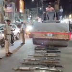 కామారెడ్డిలో 65 మోటార్సైకిల్ సైలెన్సర్ల ధ్వంసం Police destroyed 65 noisy motorcycle silencers with a road roller in Kamareddy, warning strict action against violators.