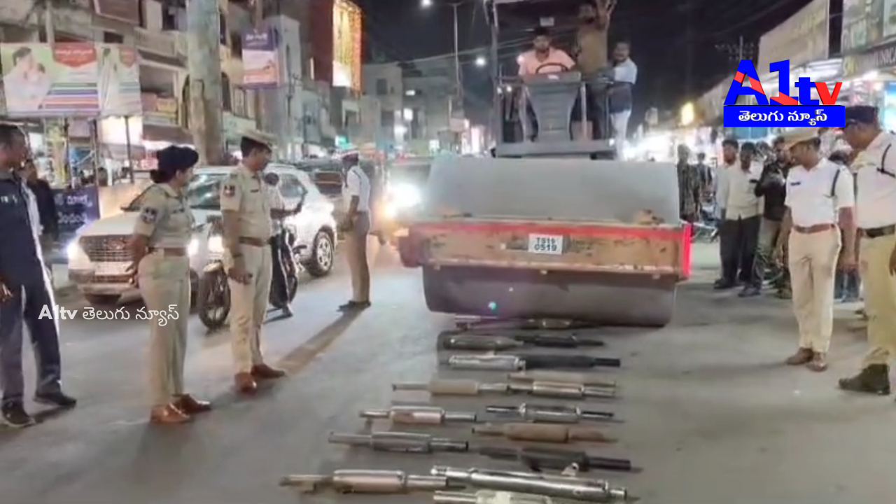 Police destroyed 65 noisy motorcycle silencers with a road roller in Kamareddy, warning strict action against violators.