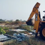 Illegal constructions on encroached land at Suram Lake, Tukkuguda, demolished after Hydra Commissioner Ranganath’s inspection.