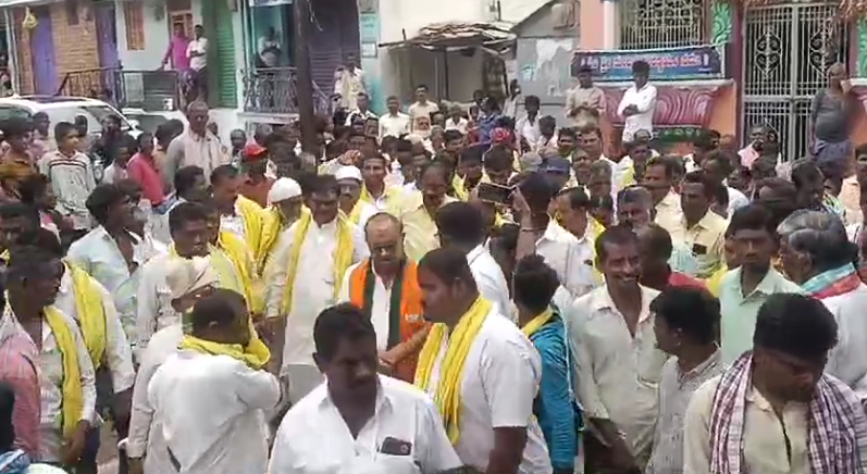 MLA Parthasarathi visits Pedda Thumbalam, highlighting government achievements, pension increases, and development promises, engaging with local residents.