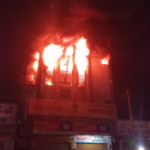 A short circuit caused a fire in the Muthoot Finance building near Chinna Agrhahara in Gadwal. Flames are spreading, and fire engines are heading to the scene for control. More details are awaited.