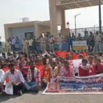 Student associations staged a protest at the Asifabad Collectorate, demanding justice for Shailaja, who died due to food poisoning. Police blocked the protestors from entering the premises.