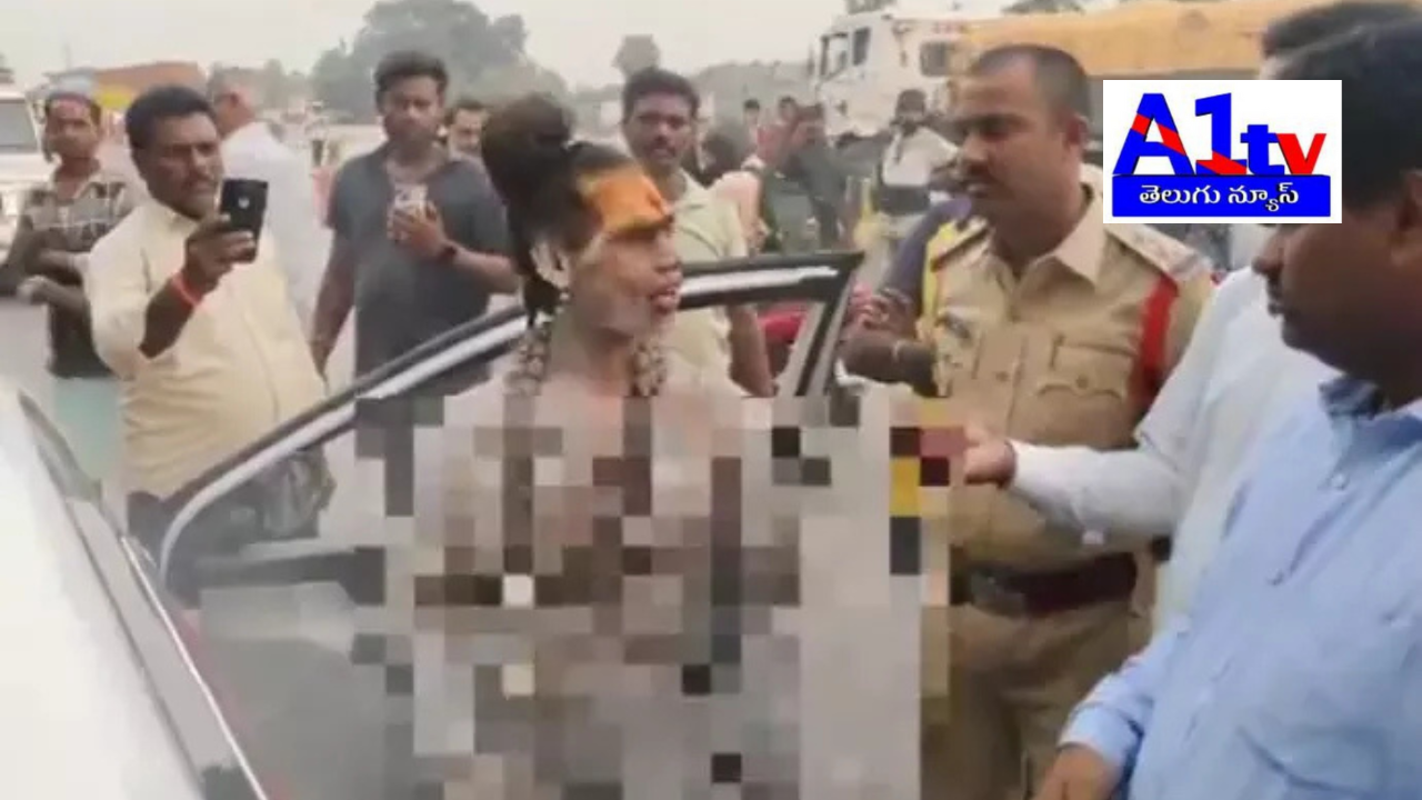 A woman aghori caused chaos near JanaSena office, Mangalagiri, demanding to meet Pawan Kalyan, attacking police and a journalist with a trident.