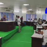 The Emmiganur Municipal Council meeting turned chaotic as ruling and opposition parties clashed over development funds and initiatives.