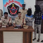Two men arrested for threatening students, stealing money at Pithapuram hostel; police warn strict action against anti-social activities in schools.