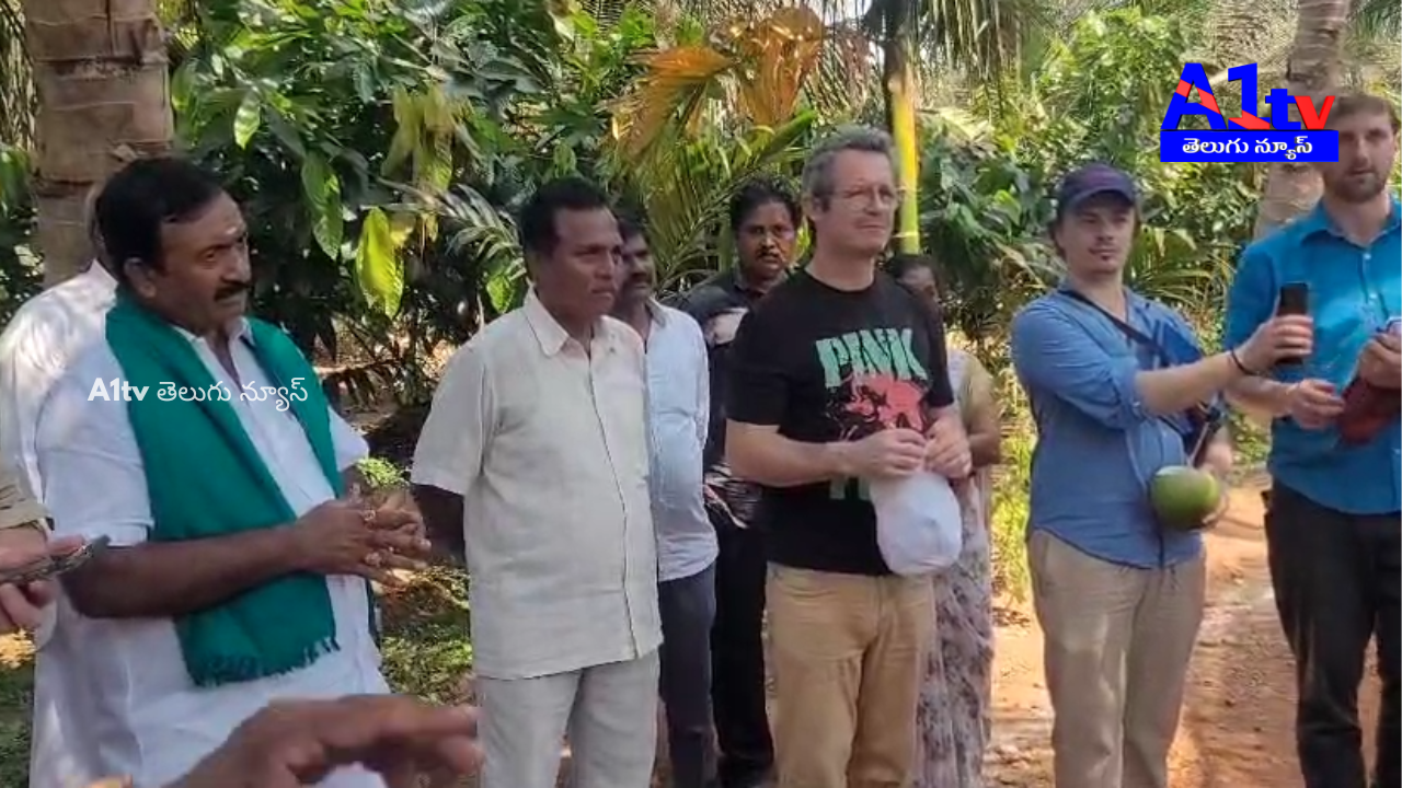 A German team inspected natural farming in Adamilli, Kamavarapukota. Local farmers and officials participated.