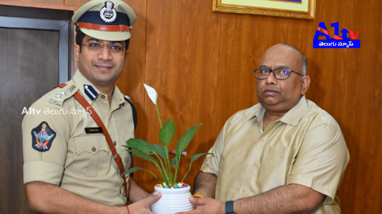 Newly appointed Kurnool SP Vikrant Patil met DIG Koya Praveen and presented a floral plant as a courtesy.