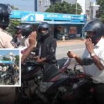Karlapalem police offering sweets to helmet-wearing riders during road safety drive