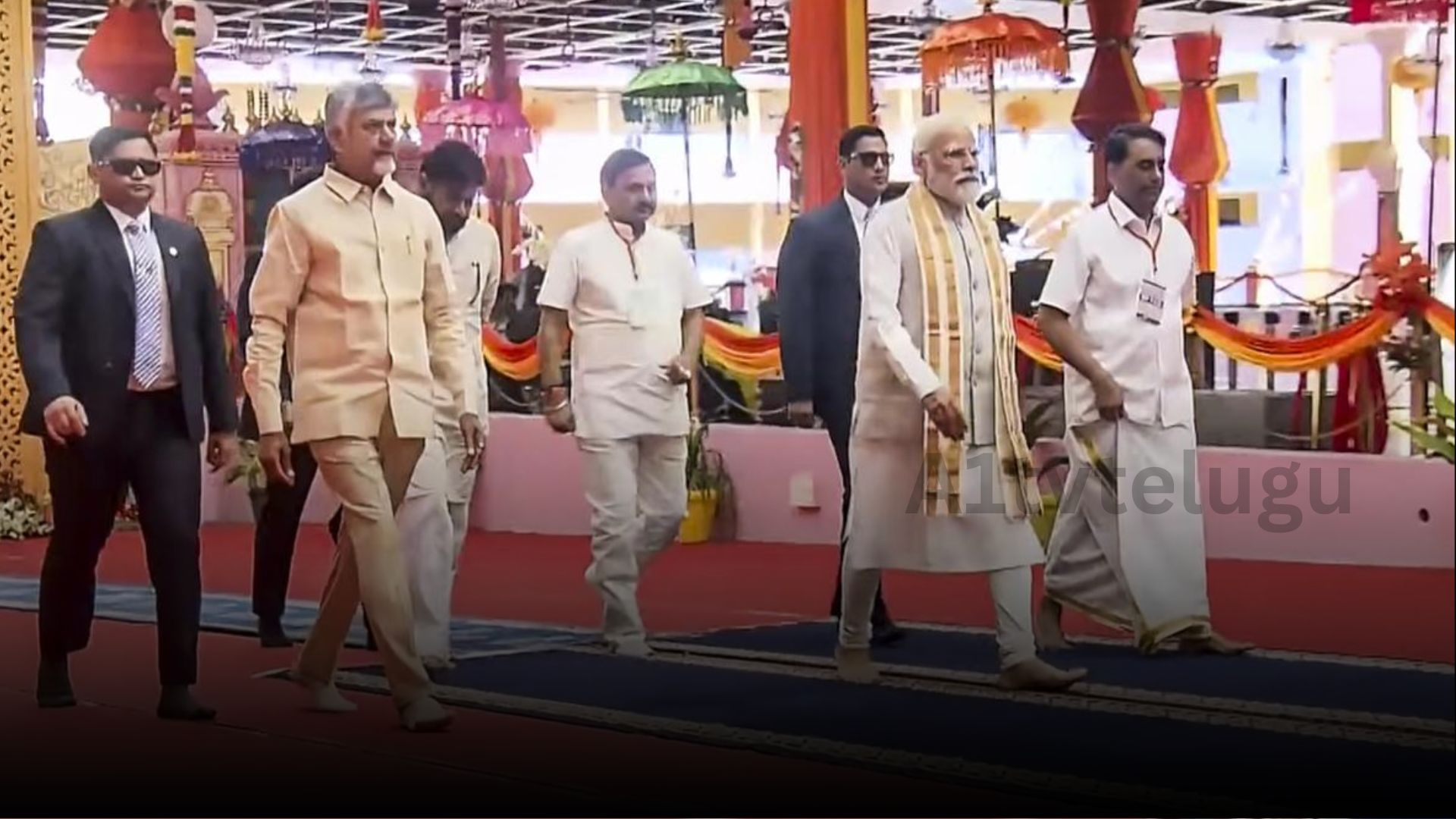 pm modi welcomed by Andhra Pradesh leaders at puttaparthi