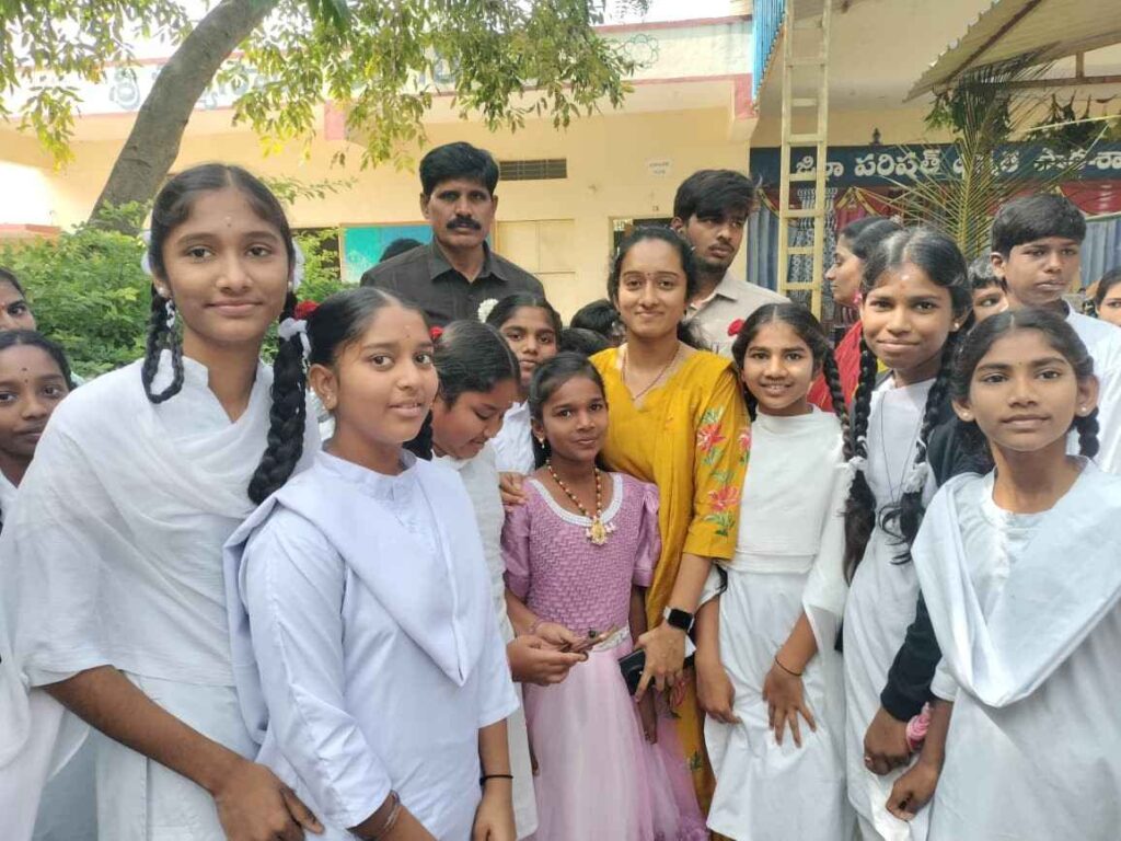 Putaparthi MLA attending a PTA meeting and presenting awards to students