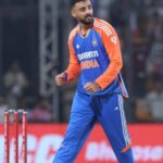 Varun Chakravarthy bowling for India in T20 cricket match