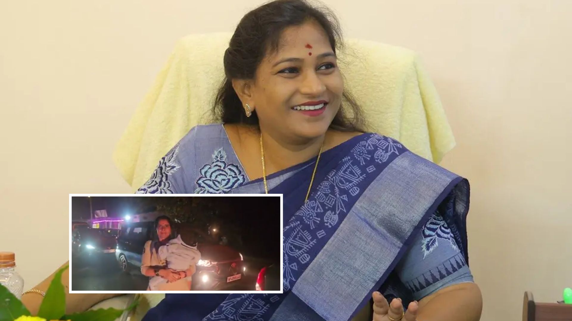 lady constable clearing traffic with baby in kakinada