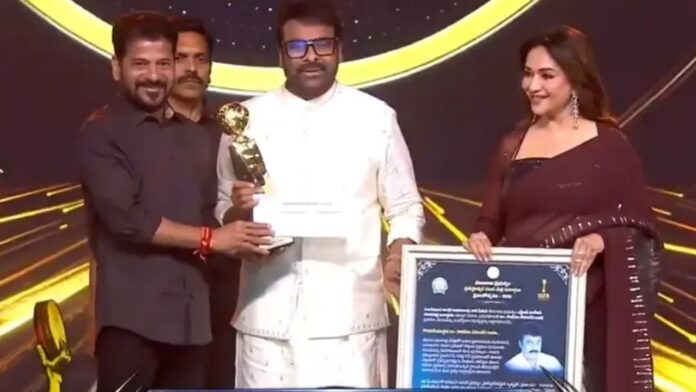 chiranjeevi receiving ntr national award at gaddar film awards event in hyderabad