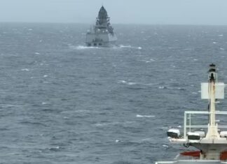 indian navy warships escorting oil tankers through hormuz strait during middle east tensions