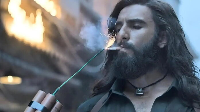 dhurandhar the revenge movie poster and theatre audience waiting for premiere