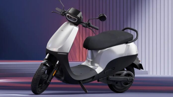 Ola Electric battery gigafactory in Tamil Nadu with engineers working on lithium-ion cells.