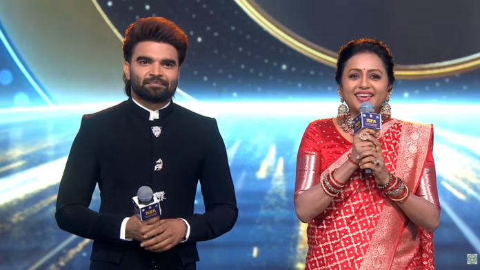 gaddar film awards event stage at hitex convention center with celebrities and hosts suma and pradeep