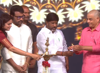 lamp lighting ceremony at gaddar cine awards event with dignitaries on stage