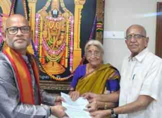 donors handing over donation dd cheques to ttd additional eo for sri venkateswara annaprasadam trust in tirumala