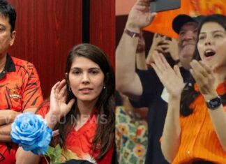 Kavya Maran smiling and accepting a rose from a fan after SRH victory at Uppal Stadium