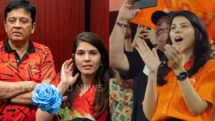 Kavya Maran smiling and accepting a rose from a fan after SRH victory at Uppal Stadium