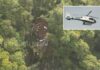 helicopter crash site in west kalimantan forest area with rescue teams searching victims