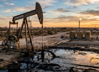 crude oil barrels and global oil price chart showing sharp decline in international market