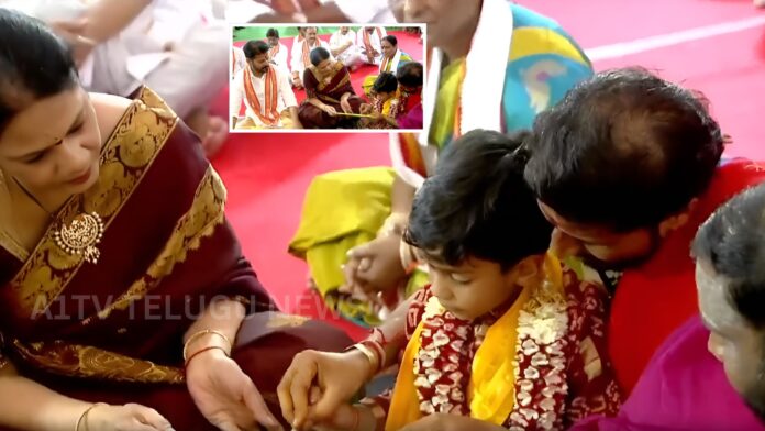 cm revanth reddy performing aksharabhyasam ceremony for grandson rudra dev at basara