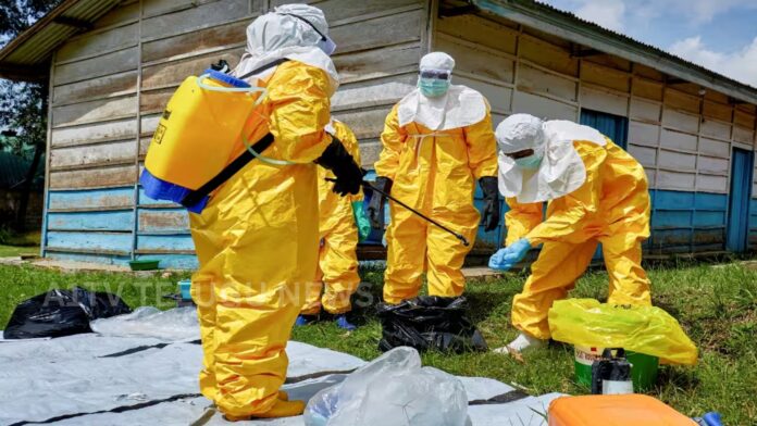 Healthcare workers in Congo dealing with Ebola outbreak and patients in isolation units