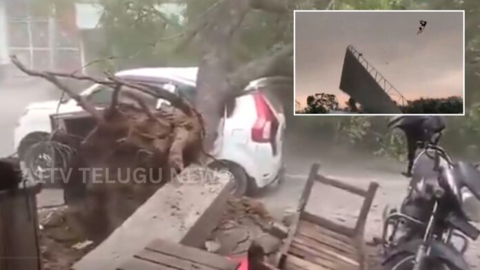 Severe storm damage in Uttar Pradesh with fallen trees, collapsed houses, and rescue operations underway