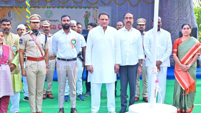 Minister Mohammed Azharuddin hoisting the national flag during Telangana Formation Day celebrations in Jagtial