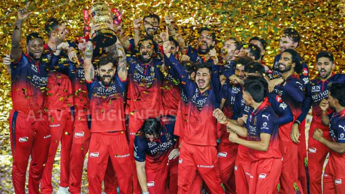 Royal Challengers Bengaluru players celebrating IPL title victory with trophy