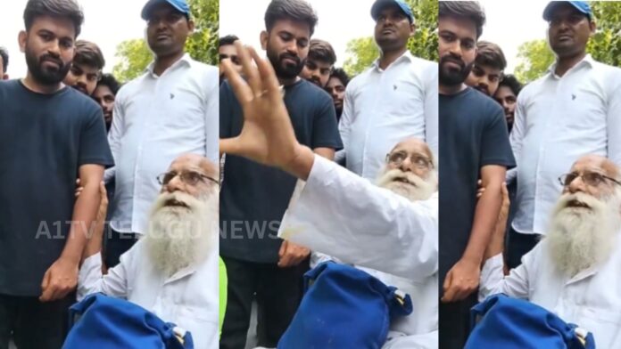 Elderly man speaking during a public protest with people listening