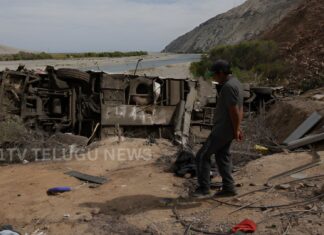 Rescue teams at the Peru bus accident site after a bus fell into a ravine