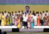 Minister Nara Lokesh distributing house pattas to beneficiaries in Mangalagiri