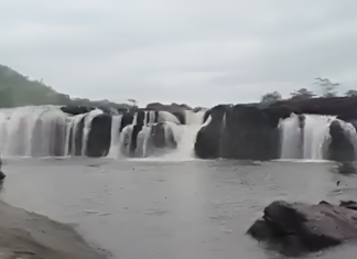 bogatha waterfall in mulugu district overflowing with heavy water flow during rainy season